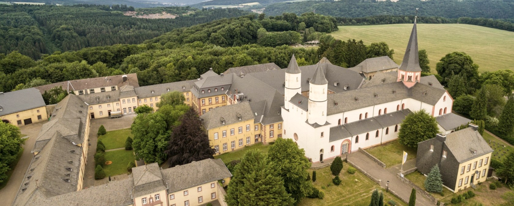 Aerial view of Steinfeld Monastery on the Eifelsteig trail, © Eifel Tourismus/D. Ketz